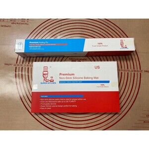 New baking mat 24x36 & metal rolling pin with rings